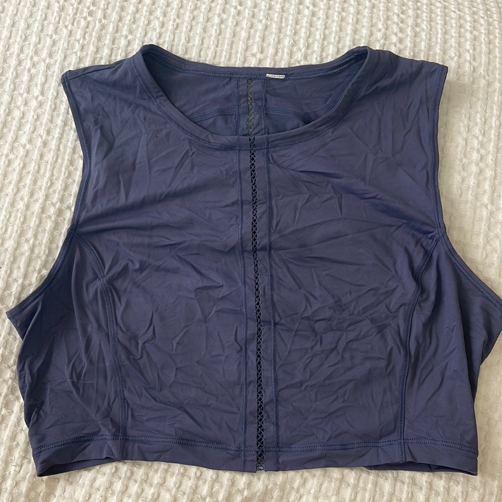 Lululemon purple crop top with fun stitching detail. Size 8